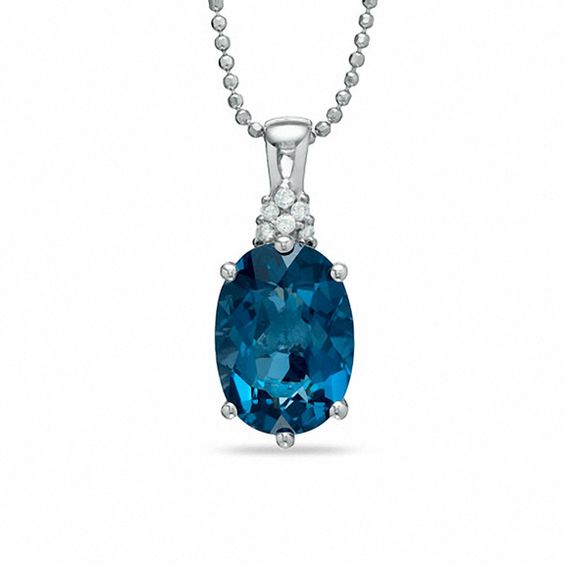 Oval London Blue Topaz Pendant In Sterling Silver With Diamond Oval London Blue Topaz Pendant In Sterling Silver With Diamond Accents