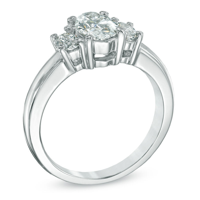 11/4 CT. T.W. Oval Diamond Three Stone Engagement Ring in 14K White