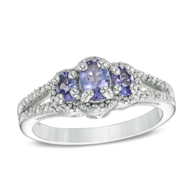 Oval Tanzanite and Diamond Accent Three Stone Frame Ring in Sterling Silver