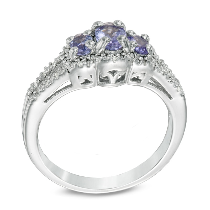 Oval Tanzanite and Diamond Accent Three Stone Frame Ring in Sterling Silver