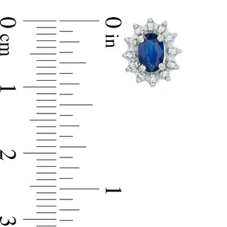 Oval Blue Sapphire and 1/5 CT. T.W. Diamond Frame Stud Earrings in 10K