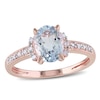 Thumbnail Image 0 of Oval Aquamarine and 1/15 CT. T.W. Diamond Ring in Rose Rhodium Sterling Silver