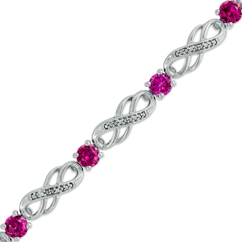 Lab-Created Ruby and 1/20 CT. T.W. Diamond Infinity Bracelet in Sterling Silver - 7.5"