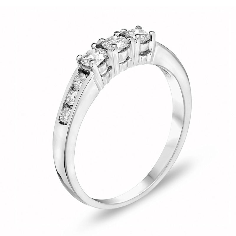 1/2 CT. T.W. Diamond Three Stone Wedding Band in 14K White Gold Round