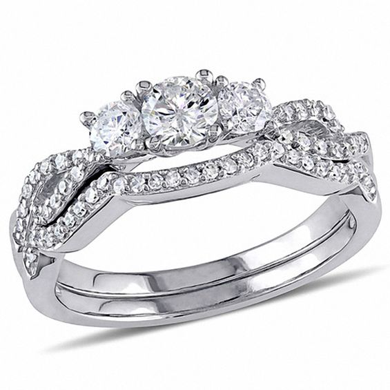 3/4 CT. T.W. Diamond Three Stone Twist Shank Bridal Set in 10K White