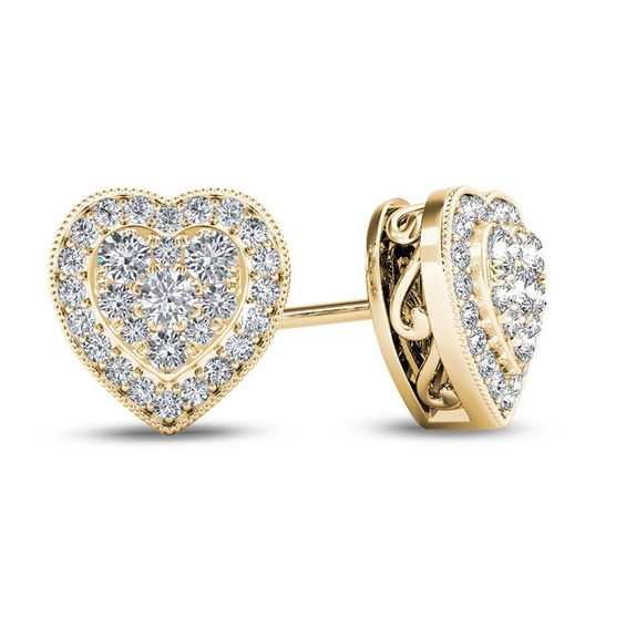 Vintage gold tone heart shaped stud earrings.