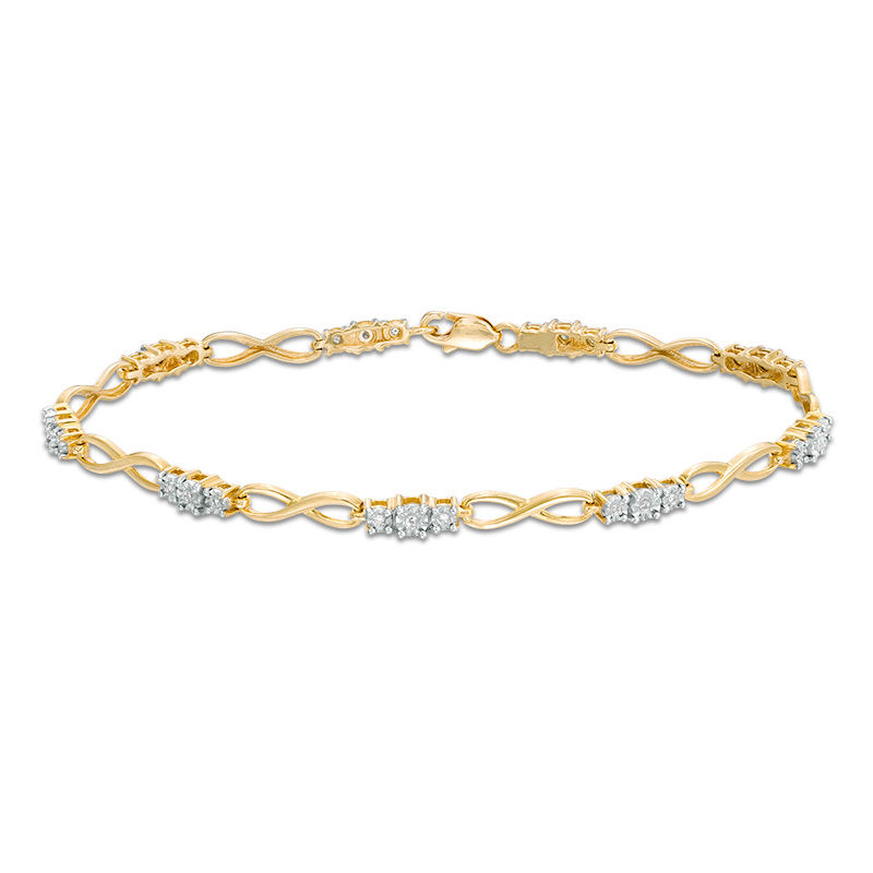 1/10 CT. T.W. Diamond Three Stone Infinity Bracelet in 10K Gold - 7.25"
