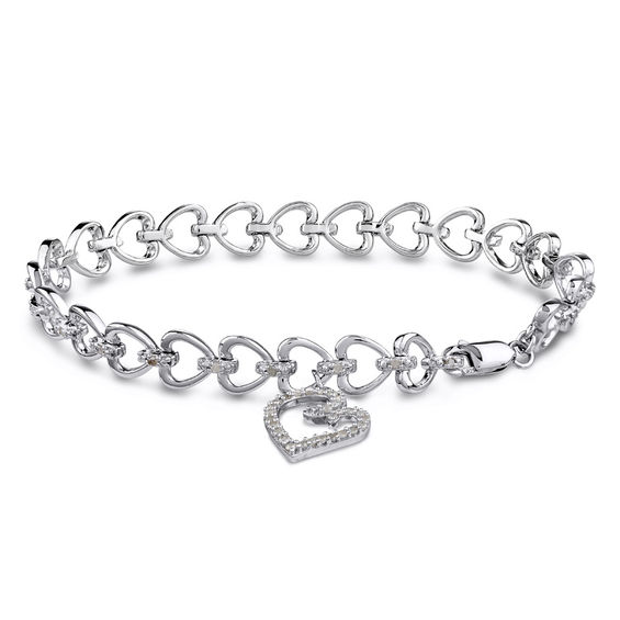 1/2 CT. T.W. Diamond Heart Link Charm Bracelet in Sterling Silver