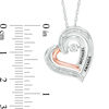 Thumbnail Image 1 of Couple's Diamond Accent Tilted Heart Pendant in Sterling Silver and 10K Rose Gold (2 Lines)