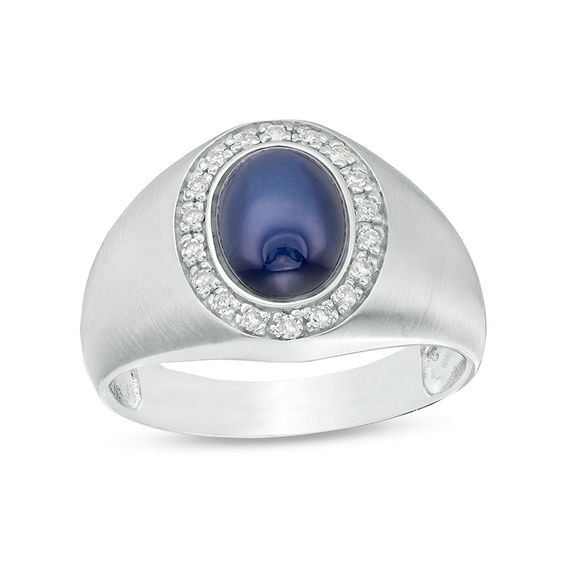 Gold sapphire ring A 9K yellow gold 8 blue sapphire cabachon ring.