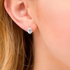 Thumbnail Image 1 of Oval Blue Topaz and 1/10 CT. T.W. Diamond Frame Stud Earrings in 10K Gold