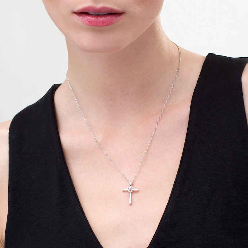 1/15 CT. T.W. Diamond Cross with Heart Pendant in Sterling Silver