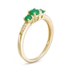 Thumbnail Image 2 of Emerald and Diamond Accent Three Stone Ring in 10K Gold