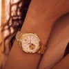 Thumbnail Image 4 of Ladies' Bulova Sutton Gold-Tone Watch with Mother-of-Pearl Dial and Skeleton Heart (Model: 97L172)