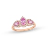 Thumbnail Image 0 of Pear-Shaped Pink and White Lab-Created Sapphire Frame Three Stone Ring in 10K Rose Gold