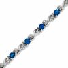 Thumbnail Image 1 of Oval Blue Sapphire "S" Bracelet in 10K White Gold with Diamond Accents