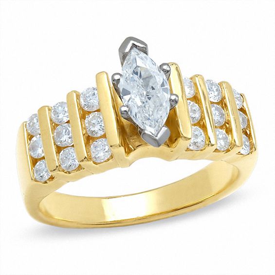 1-1/4 CT. T.w. Marquise and Round Diamond Engagement Ring in 14K Gold