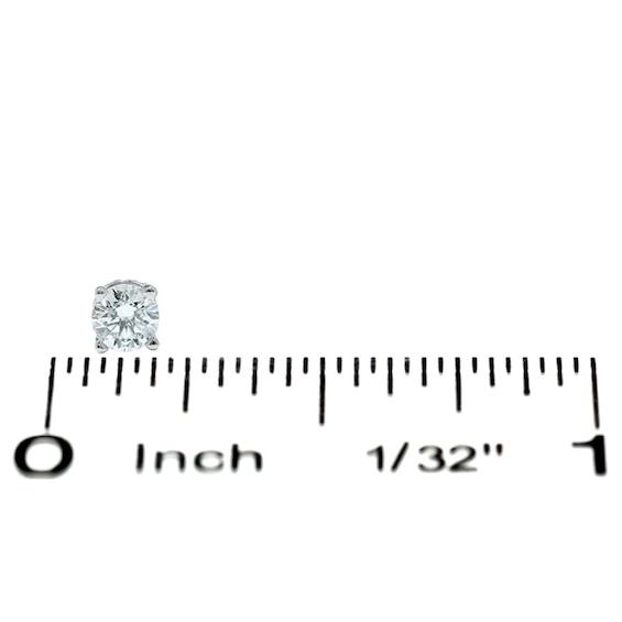 1/ CT. T.w. Diamond Solitaire Stud Earrings in 14K White Gold (I/I1