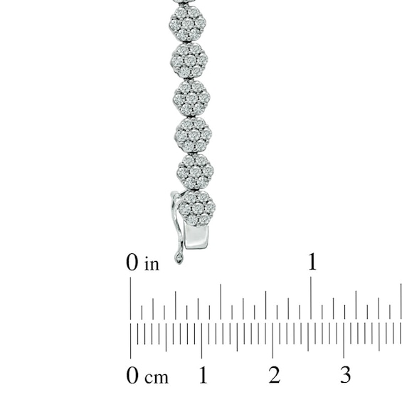 5 CT. T.w. Multi-Diamond Graduated Flower Bracelet in 14K White Gold
