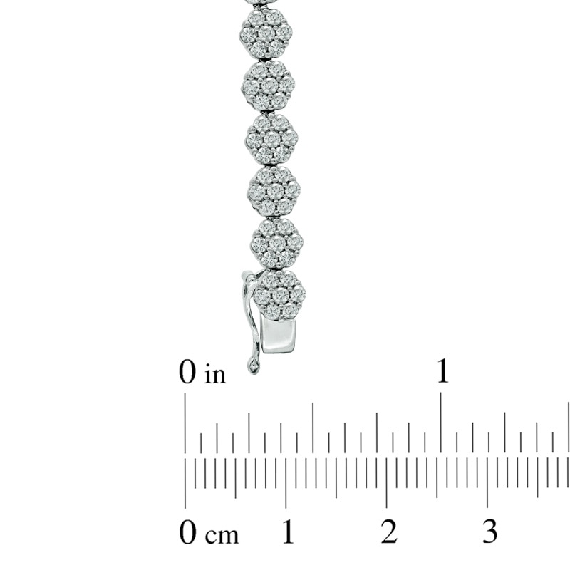 5 CT. T.W. Multi-Diamond Graduated Flower Bracelet in 14K White Gold