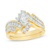 Thumbnail Image 1 of 3/4 CT. T.W. Diamond Bypass Slant Wedding Ensemble in  14K Gold - Size 7 and 10