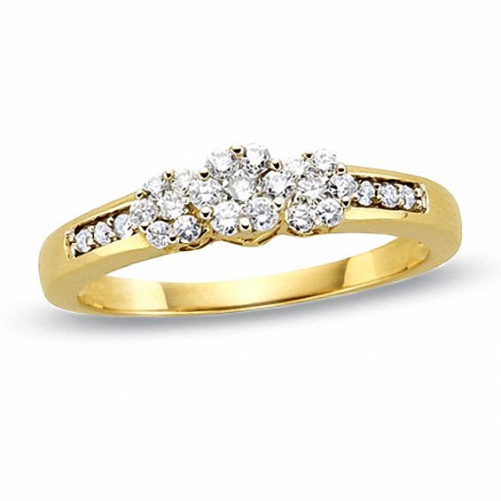 1/5 CT. T.w. Multi-Diamond Flower Three Stone Ring in 10K Gold