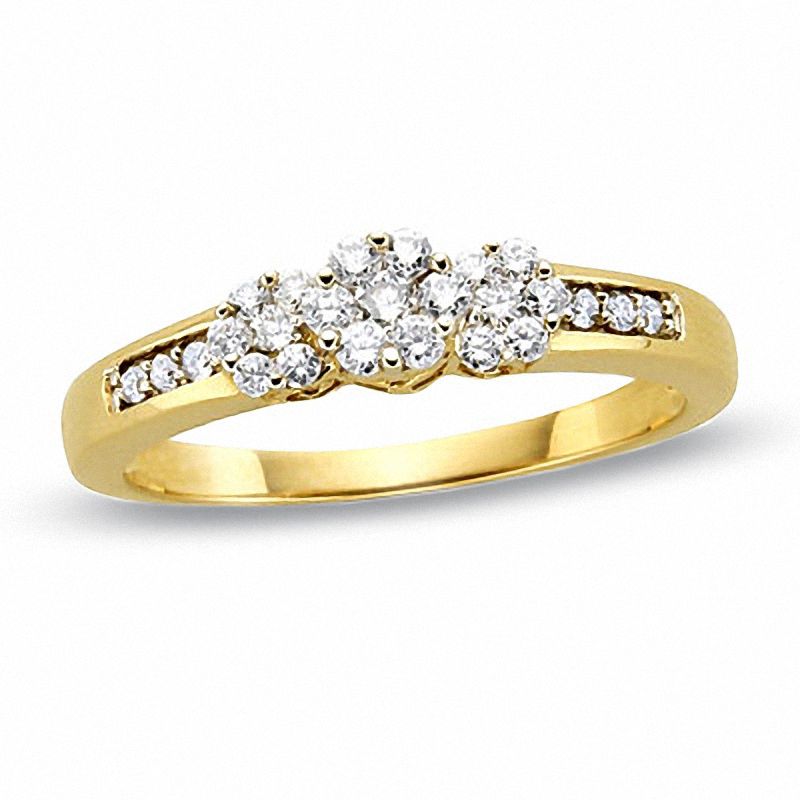Main Image 1 of 1/5 CT. T.W. Multi-Diamond Flower Three Stone Ring in 10K Gold