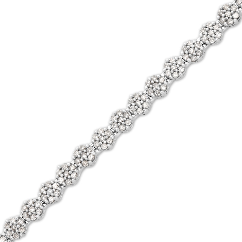 1 CT. T.W. Diamond Flower Tennis Bracelet in 10K White Gold