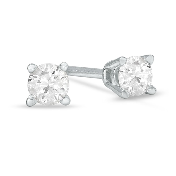 1/ CT. T.w. Diamond Solitaire Stud Earrings in 14K White Gold (J/I3