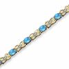 Thumbnail Image 1 of Oval Blue Topaz Fashion Bracelet in 10K Gold with Diamond Accents