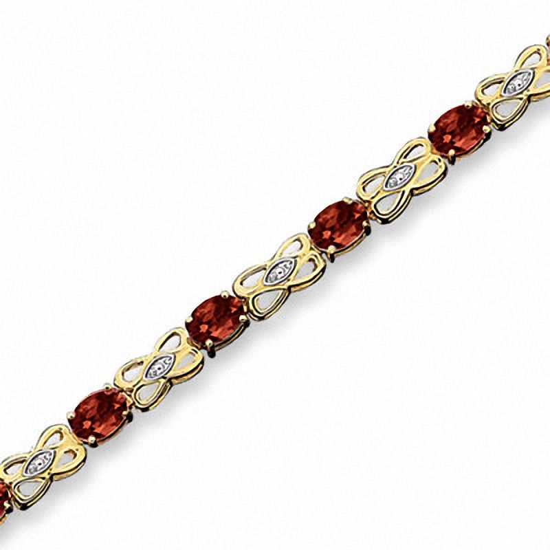 Main Image 1 of Oval Garnet Fashion Bracelet in 10K Gold with Diamond Accents