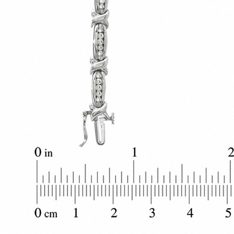Main Image 3 of 1 CT. T.W. Diamond Channel "X" Bracelet in 10K White Gold