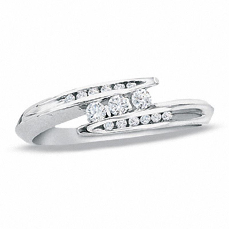 Main Image 1 of 1/5 CT. T.W. Diamond Three Stone Bypass Ring in 10K White Gold