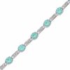 Thumbnail Image 1 of Simulated Aquamarine and Diamond Station Bracelet in Sterling Silver