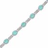 Thumbnail Image 0 of Simulated Aquamarine and Diamond Station Bracelet in Sterling Silver