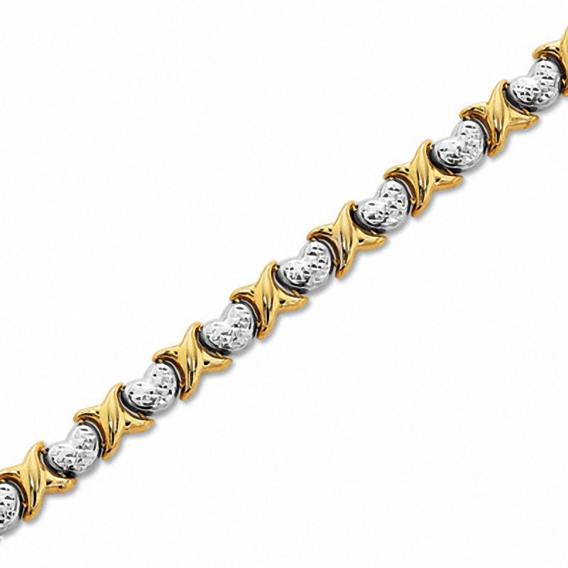 Main Image 1 of "X" and Heart Stampato Bracelet in 10K Two-Tone Gold - 7.25"