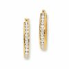 Thumbnail Image 0 of 1/4 CT. T.W. Channel-Set Diamond Oval Hoop Earrings in 14K Two-Tone Gold