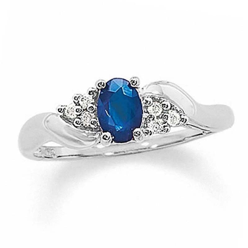 Main Image 1 of Oval Blue Sapphire and 1/20 CT. T.W. Diamond Twist Ring in 10K White Gold