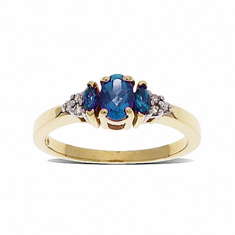 Main Image 1 of Blue Topaz Three Stone Ring in 10K Gold with Diamond Accents