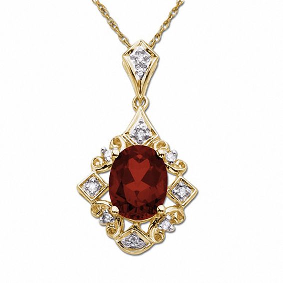 Oval Garnet Drop Pendant in 14K Gold with Diamond Accents