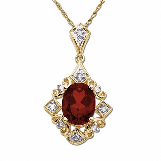 Oval Garnet Drop Pendant in 14K Gold with Diamond Accents