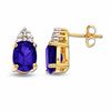 Thumbnail Image 0 of Oval Ceylon Sapphire Earrings in 14K Gold with Diamond Accents