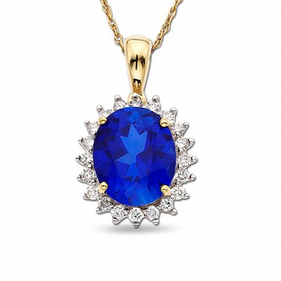 1/2 CT. T.w. Diamond and Oval Blue Sapphire Pendant in 10K Gold