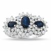 Thumbnail Image 0 of Three Stone Blue Sapphire and 1-1/5 CT. T.W. Diamond Ring in 14K White Gold