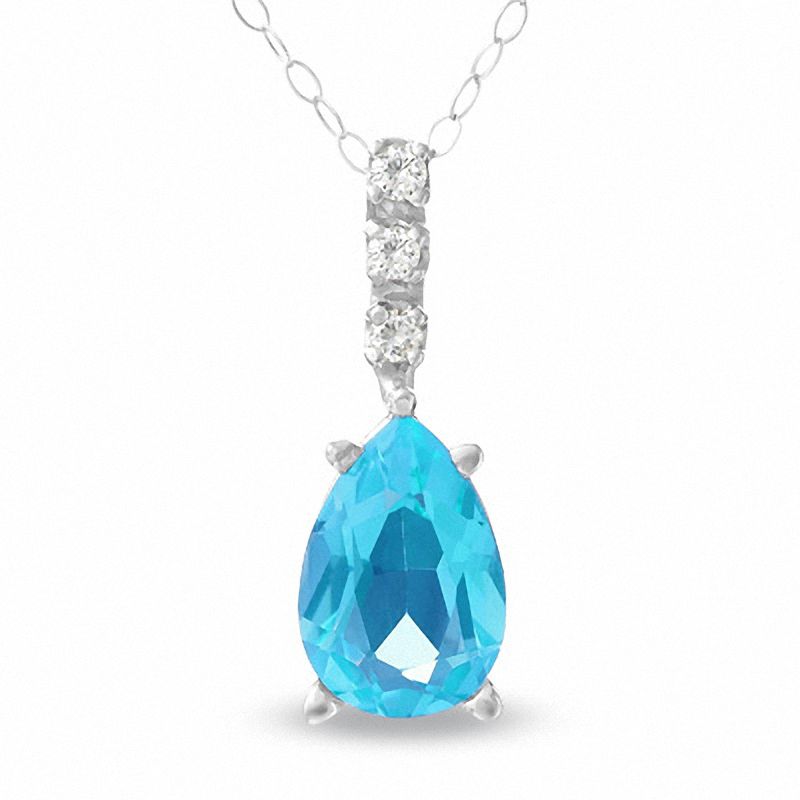 Pear-Shaped Blue Topaz Drop on Three Stone Diamond Bale Pendant in 14K White Gold