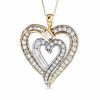 Thumbnail Image 0 of 1 CT. T.W. Round and Baguette Diamond Echo Heart Pendant in 10K Two-Tone Gold