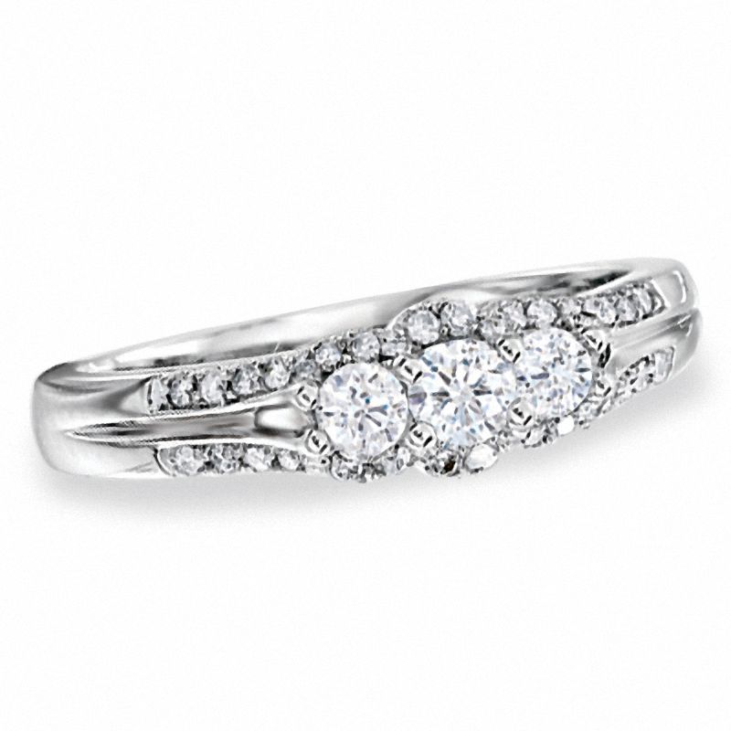 Main Image 1 of 1/2 CT. T.W. Diamond Pavé Three Stone Framed Ring in 10K White Gold