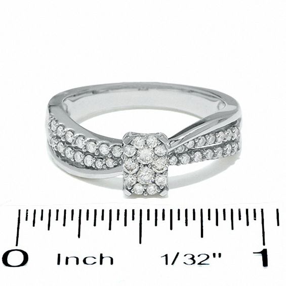 1/2 CT. T.w. Diamond Emerald-Shape Flower Ring in 14K White Gold