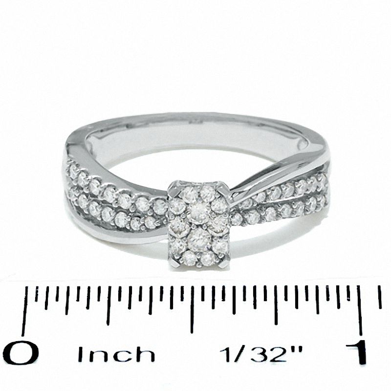 1/2 CT. T.W. Diamond Emerald-Shape Flower Ring in 14K White Gold