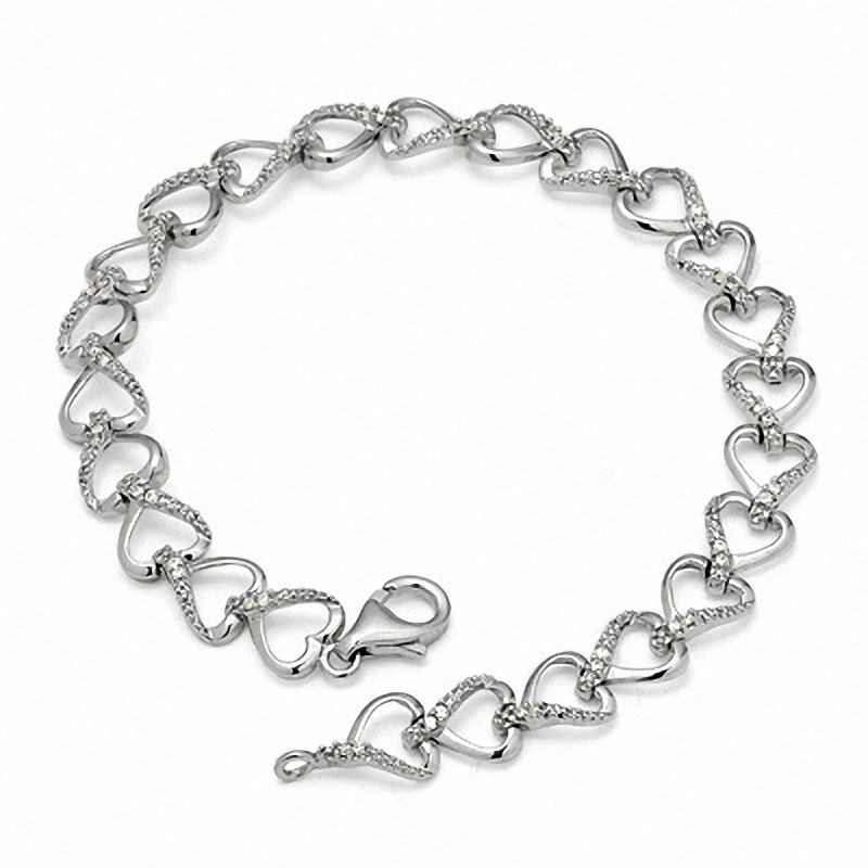 Zales 1/5 Ct. T.W. Diamond Heart Assorted Charm Bracelet in Sterling Silver